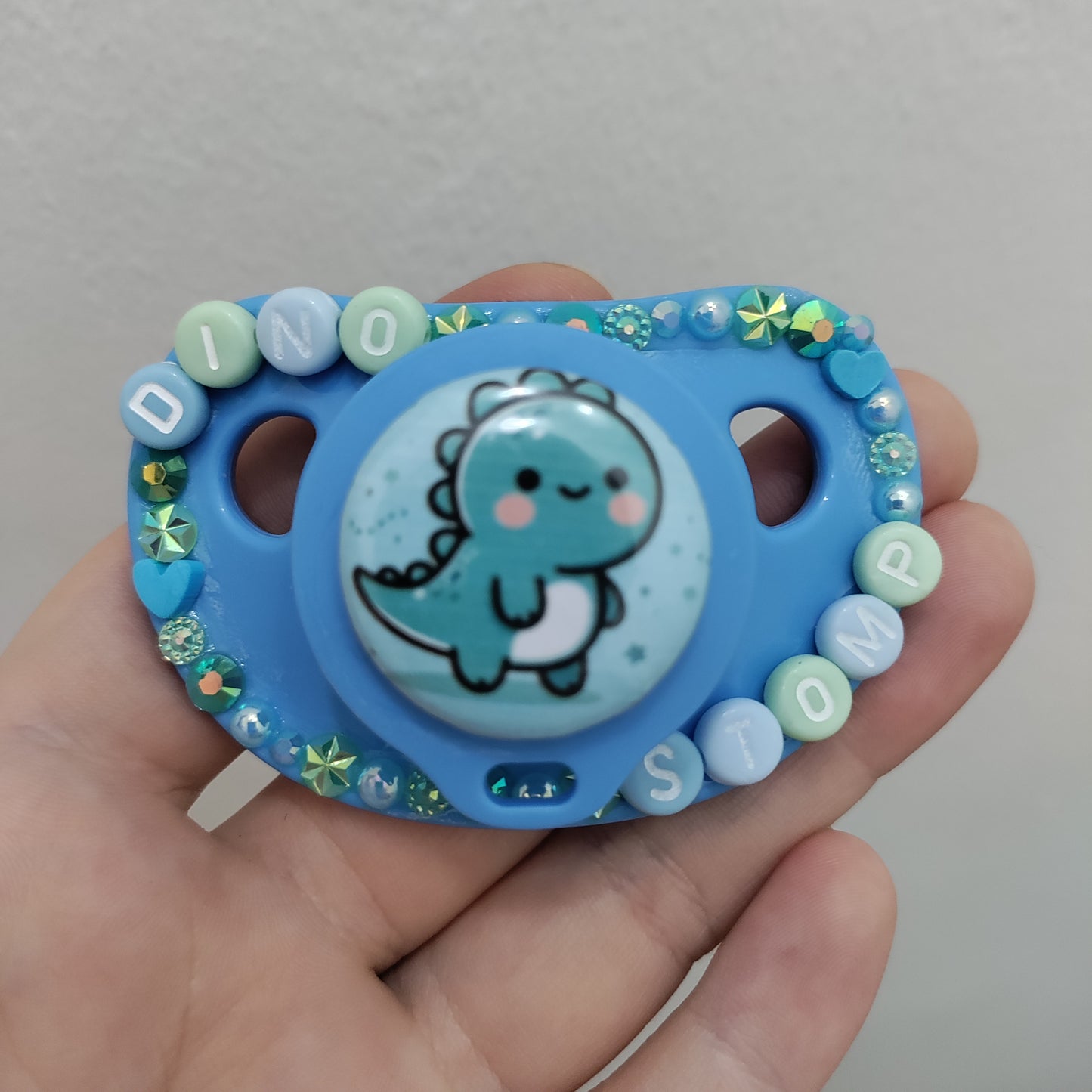 'Dino Stomp' Handless Paci